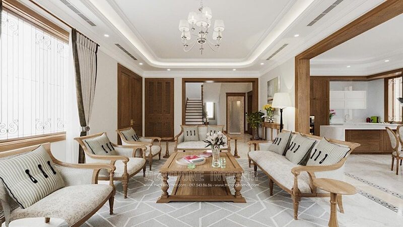 Mẫu bàn trà gỗ tự nhiên tân cổ điển cùng bộ ghế sofa gỗ sồi ấn tượng tạo điểm nhân cho căn phòng.